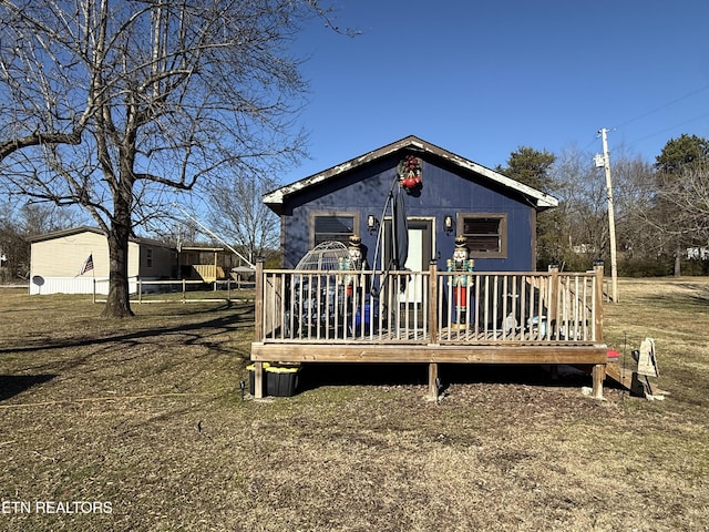 view of front of house with a wooden deck