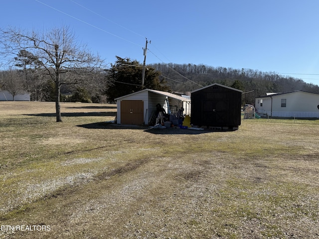 view of outbuilding with a lawn