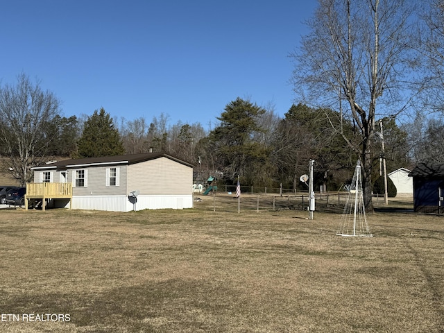 view of yard with a deck