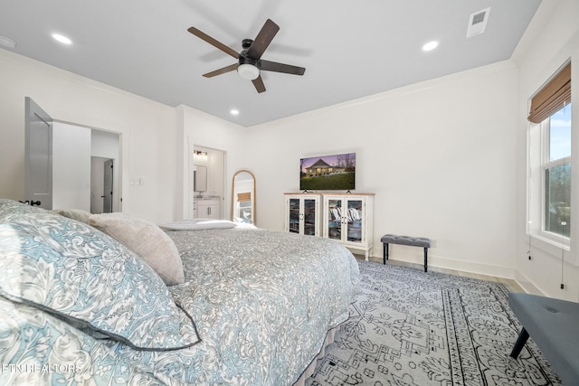 bedroom with ceiling fan and crown molding