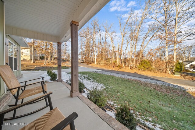 view of patio featuring covered porch