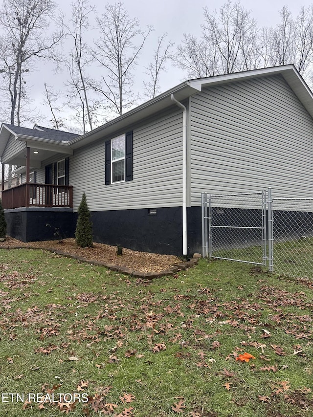 view of property exterior featuring a yard