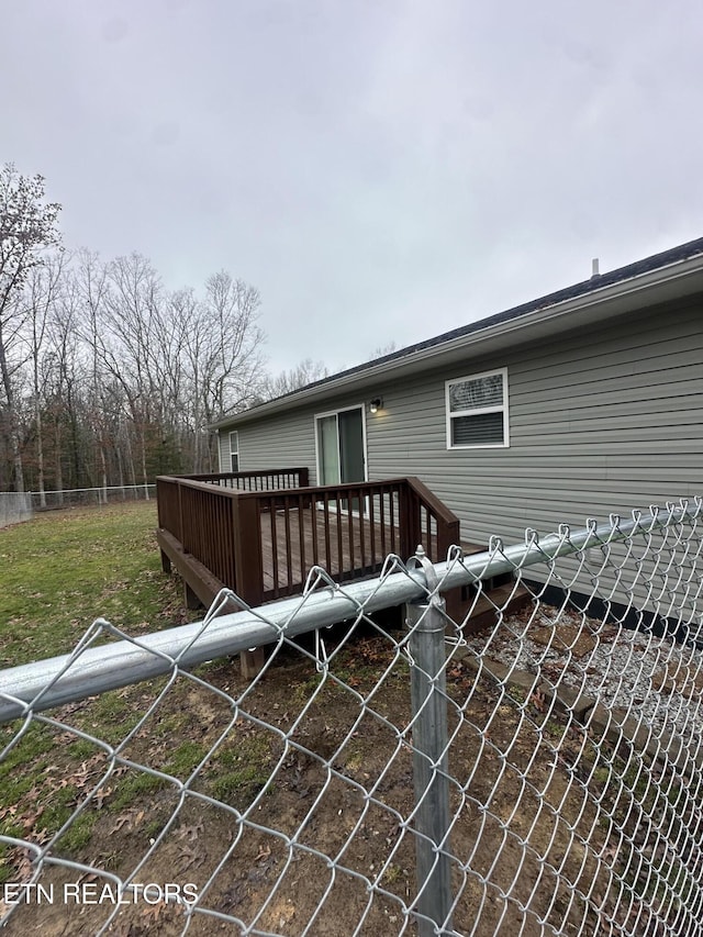 exterior space featuring a wooden deck