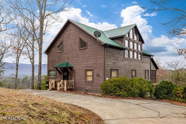 view of side of property featuring a mountain view