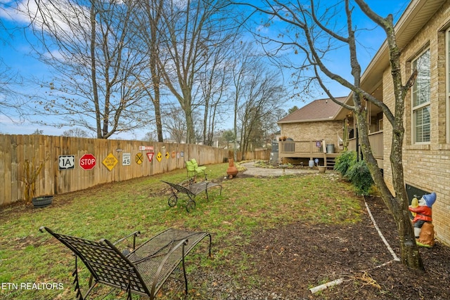 view of yard with a deck