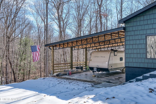 exterior space featuring a carport