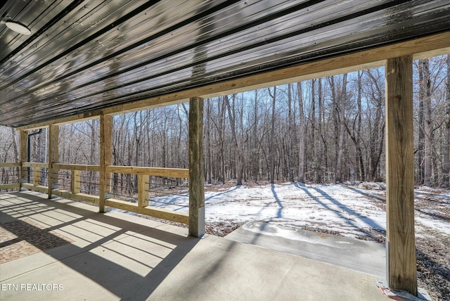 view of snow covered patio