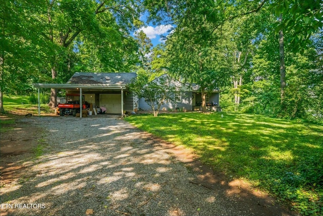 view of yard with a garage