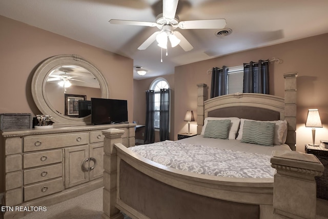 carpeted bedroom featuring ceiling fan