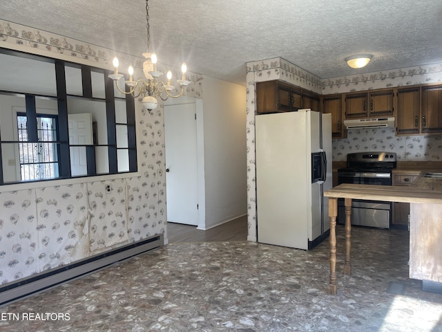 kitchen with a baseboard heating unit, hanging light fixtures, white refrigerator with ice dispenser, a textured ceiling, and stainless steel range with electric cooktop