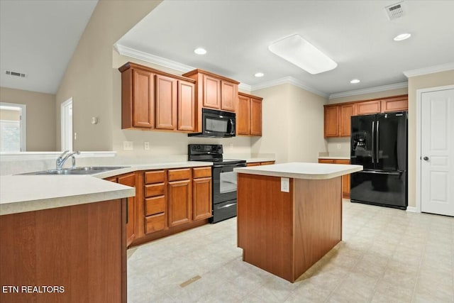 kitchen featuring ornamental molding, a center island, sink, and black appliances