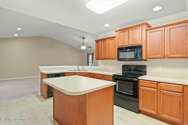 kitchen with lofted ceiling, sink, a center island, ceiling fan, and black appliances