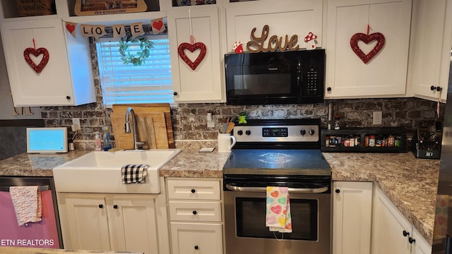 kitchen featuring stainless steel appliances, backsplash, light stone countertops, white cabinets, and sink