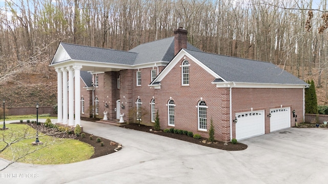 view of property exterior featuring a garage