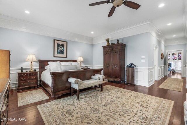 bedroom with crown molding, ceiling fan, and dark hardwood / wood-style flooring