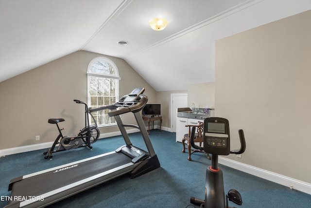 workout area with lofted ceiling