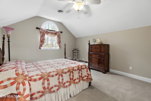 carpeted bedroom with lofted ceiling and ceiling fan