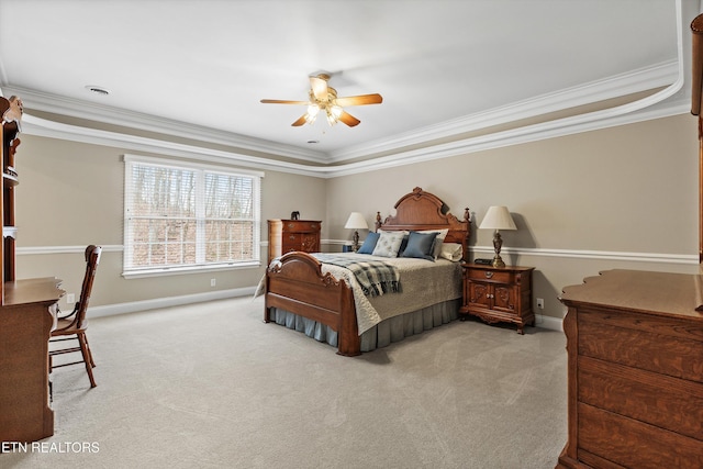 bedroom with ceiling fan, ornamental molding, and light carpet