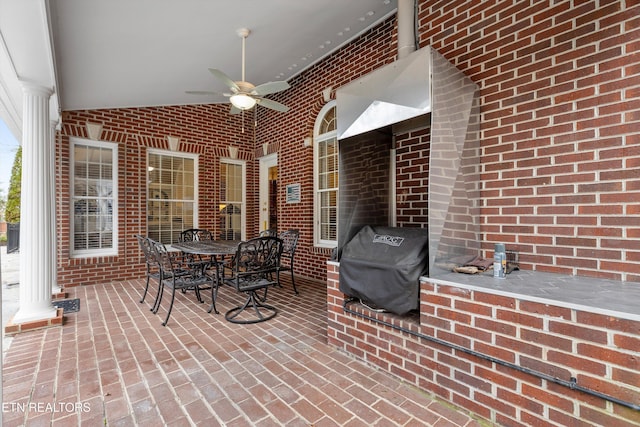 view of patio / terrace with area for grilling and ceiling fan