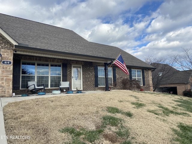 view of front of home with a front yard