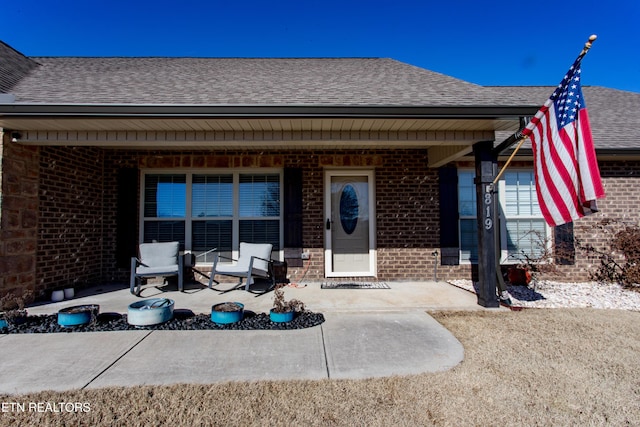 property entrance featuring a patio