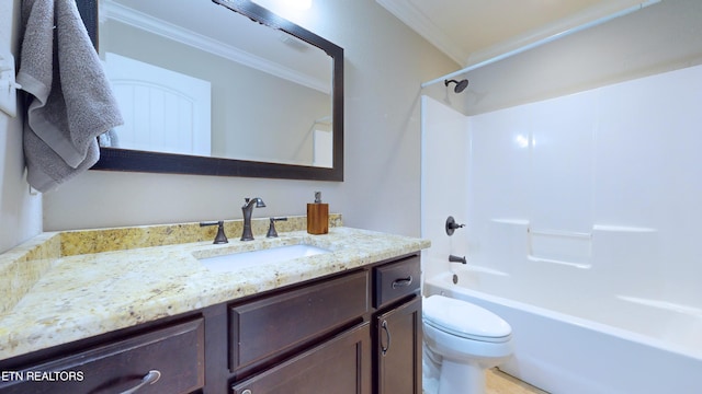 full bathroom featuring toilet, ornamental molding, shower / washtub combination, and vanity