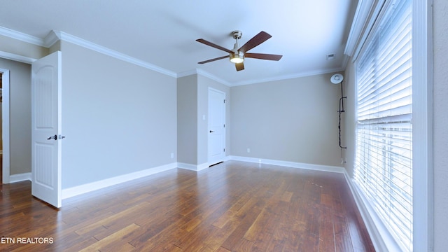 empty room featuring ceiling fan, dark wood-type flooring, and ornamental molding