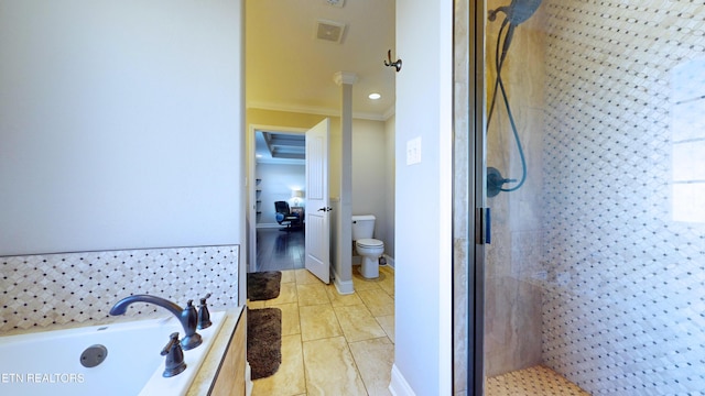 bathroom with tile patterned floors, toilet, ornamental molding, and separate shower and tub