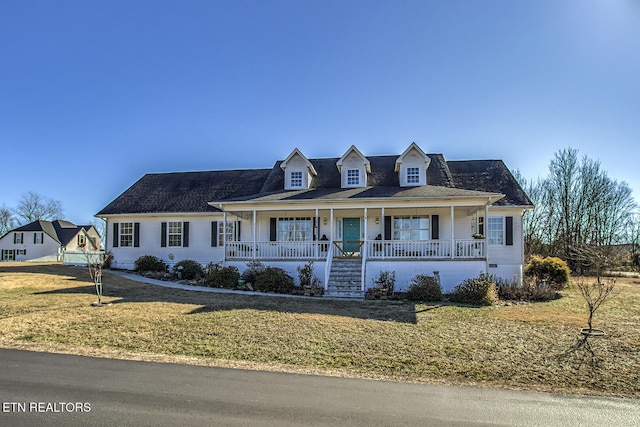 view of front of home featuring covered porch and a front lawn