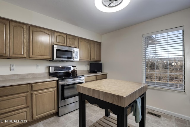 kitchen with appliances with stainless steel finishes