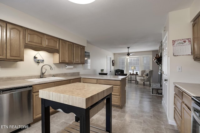 kitchen with sink, dishwasher, ceiling fan, and kitchen peninsula