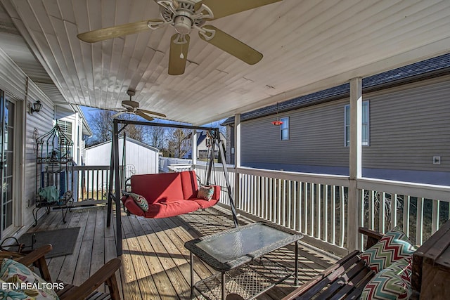 wooden terrace with ceiling fan