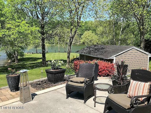 view of patio / terrace with a water view