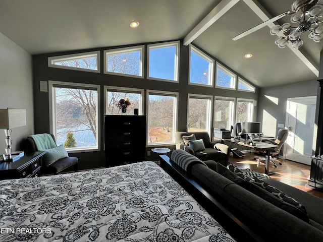 bedroom featuring hardwood / wood-style flooring and lofted ceiling with beams