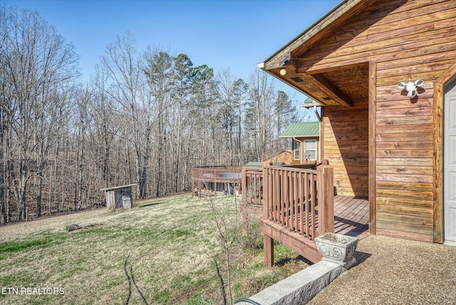 view of yard featuring a deck