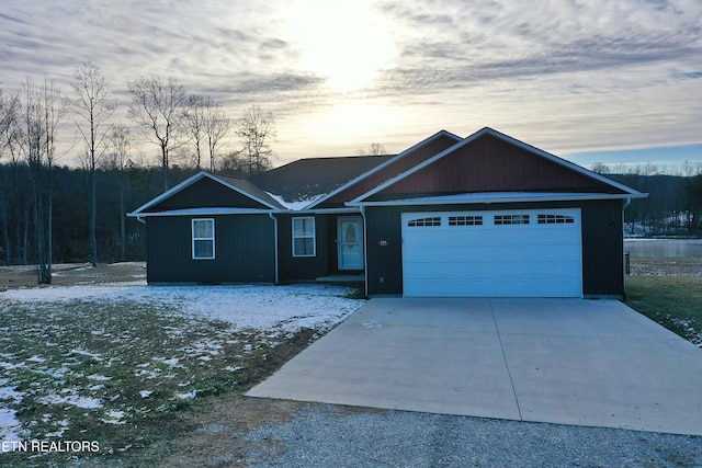 single story home with a garage