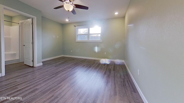 unfurnished bedroom featuring hardwood / wood-style floors and ceiling fan