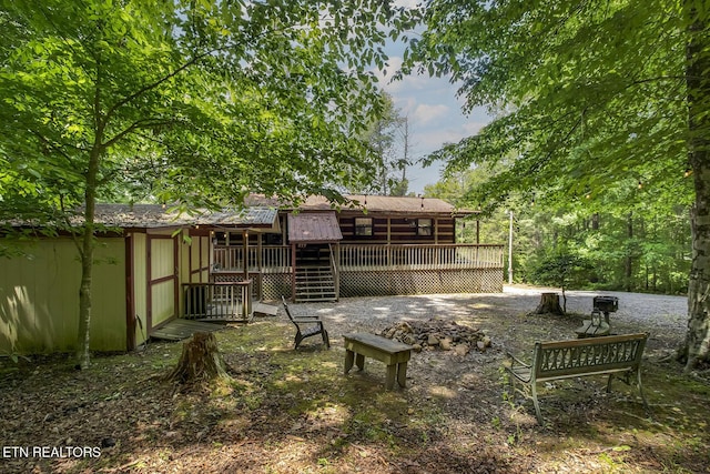 view of yard with a wooden deck