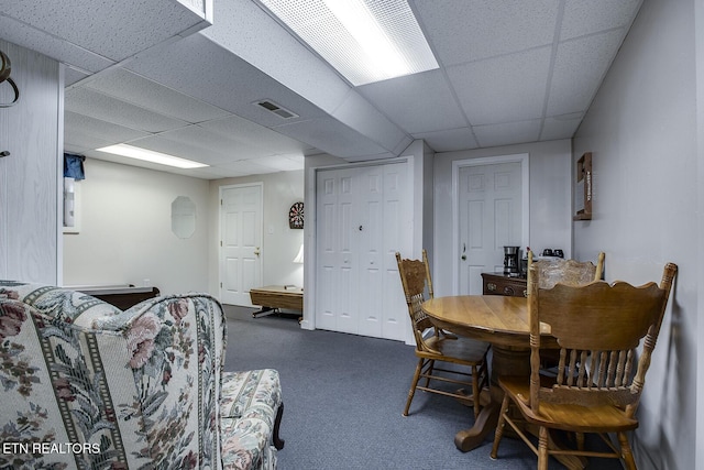 carpeted dining room featuring pool table and a paneled ceiling