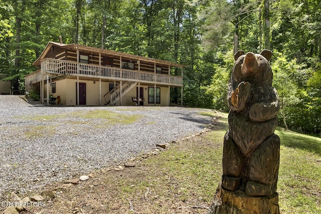 exterior space featuring a wooden deck