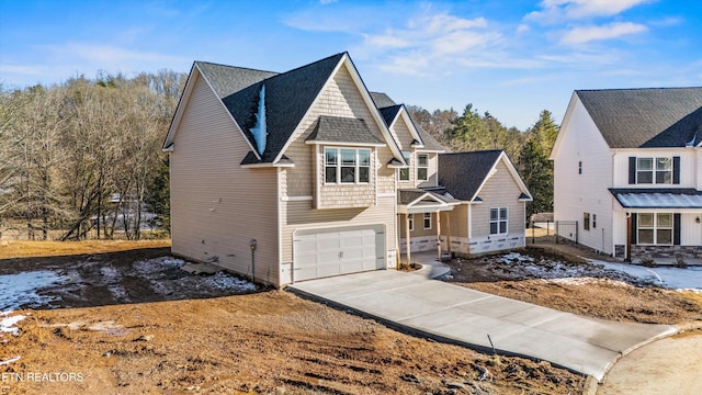 view of front of home with a garage