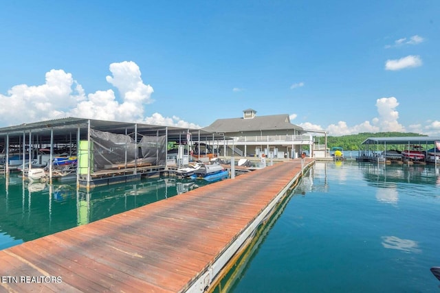 view of dock with a water view