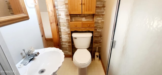 bathroom with sink and toilet