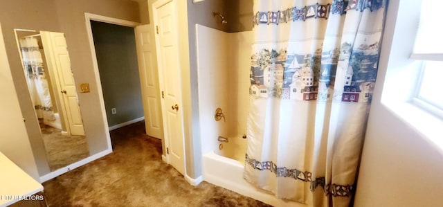 bathroom featuring shower / tub combo with curtain