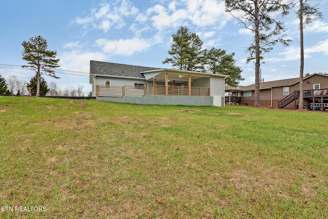 view of yard with a sunroom