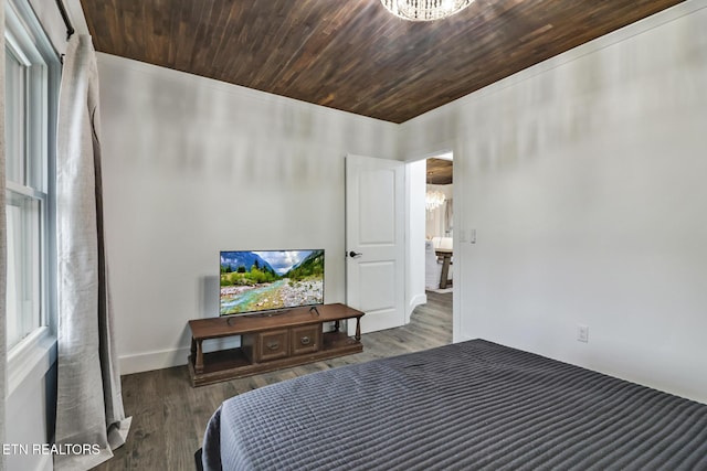 bedroom with dark wood-type flooring, wood ceiling, and an inviting chandelier