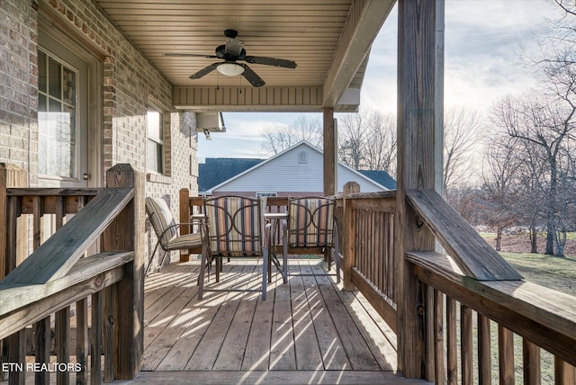 wooden terrace with ceiling fan