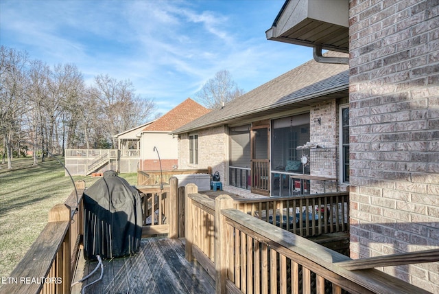 wooden deck with area for grilling