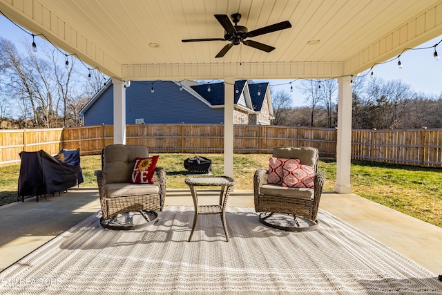 view of patio / terrace featuring ceiling fan