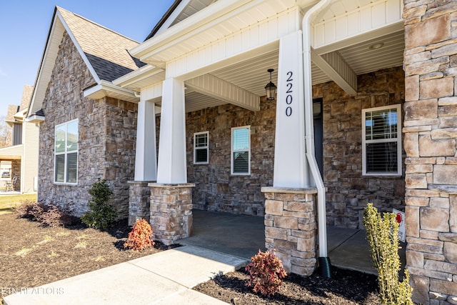 property entrance with covered porch